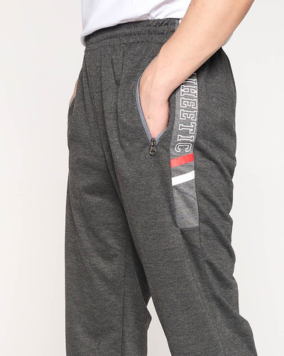 Pánske tmavošedé tepláky s nápismi - Clothing