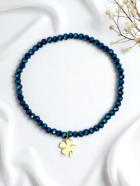 Royalfashion Dámsky náramok s príveskom v tvare štvorlístka