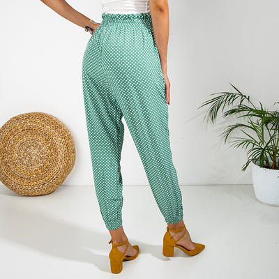 Dámske zelené bodkované nohavice PLUS SIZE - Oblečenie