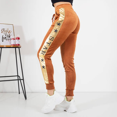 Dámske hnedé tepláky so zlatými pruhmi - Oblečenie