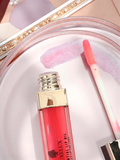 Vlažilno olje za ustnice Xoxo