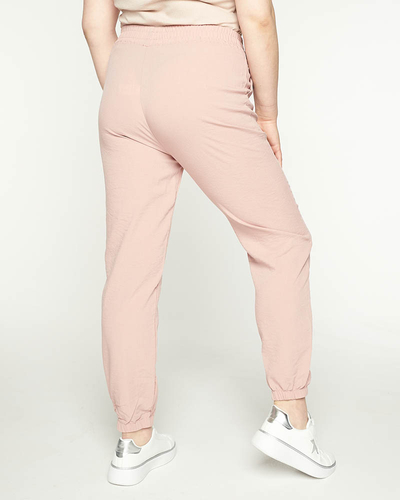 Dámske ružové látkové joggery PLUS SIZE - Oblečenie