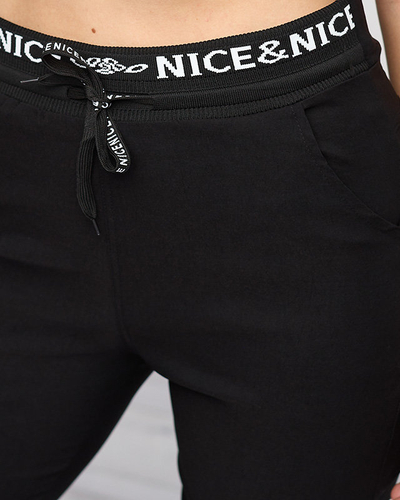 Čierne dámske teplákové súpravy s bielymi nápismi - Clothing