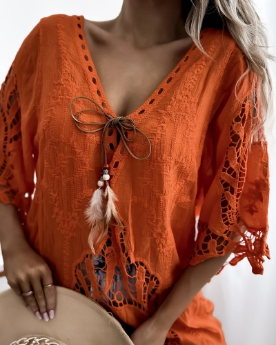 Royalfashion Oranžové dámske plážové šaty na posteľ