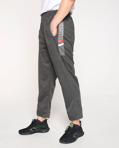 Pánske tmavošedé tepláky s nápismi - Clothing