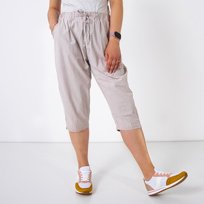 Dámske béžové šortky 3/4 dĺžky s vreckami - Oblečenie