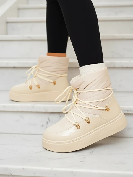 Royalfashion Dámske snehové čižmy v krémovej farbe Dabenda