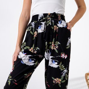 Čierne dámske nohavice s kvetinovým vzorom - Oblečenie