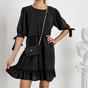 Čierne dámske šaty s kabelkou - oblečenie