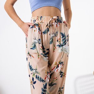 Dámske béžové nohavice s kvetinovým vzorom - Oblečenie