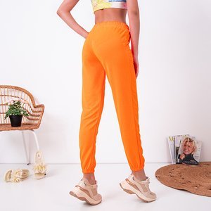 Neonovo oranžové dámske tepláky - Oblečenie